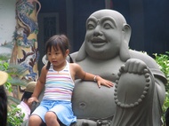A child embraced by Buddha