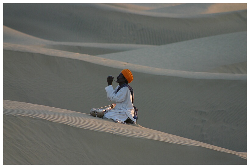 Praying in Sam Sand Dunes