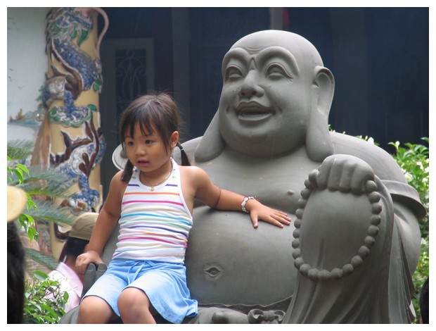 A child embraced by Buddha